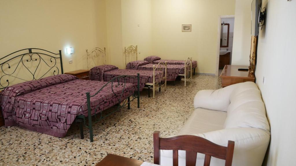 Postel nebo postele na pokoji v ubytování Masseria Lama D'impisa