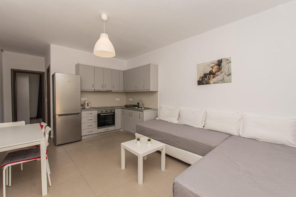 Kuchyň nebo kuchyňský kout v ubytování Lofos Apartments