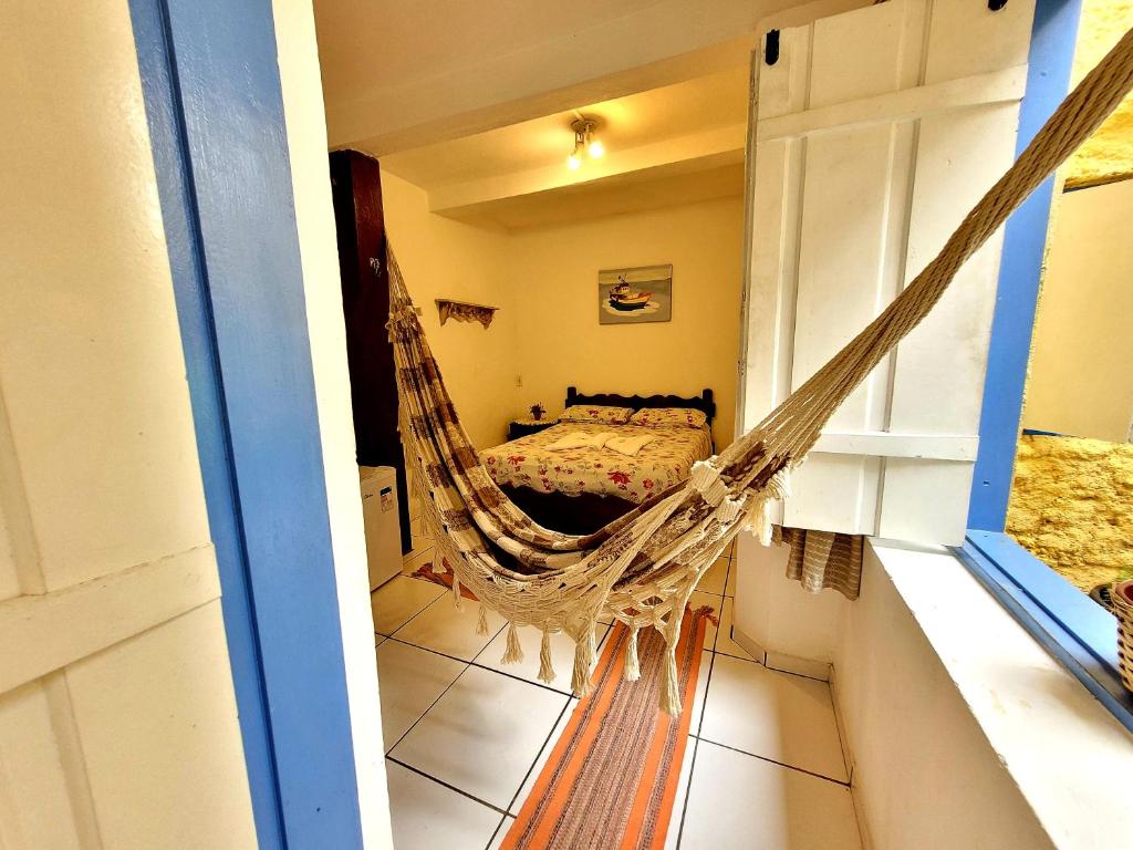 Postel nebo postele na pokoji v ubytování Pousada Recanto dos Nativo