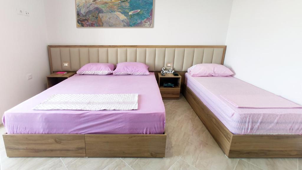 Postel nebo postele na pokoji v ubytování Villa Luelfa