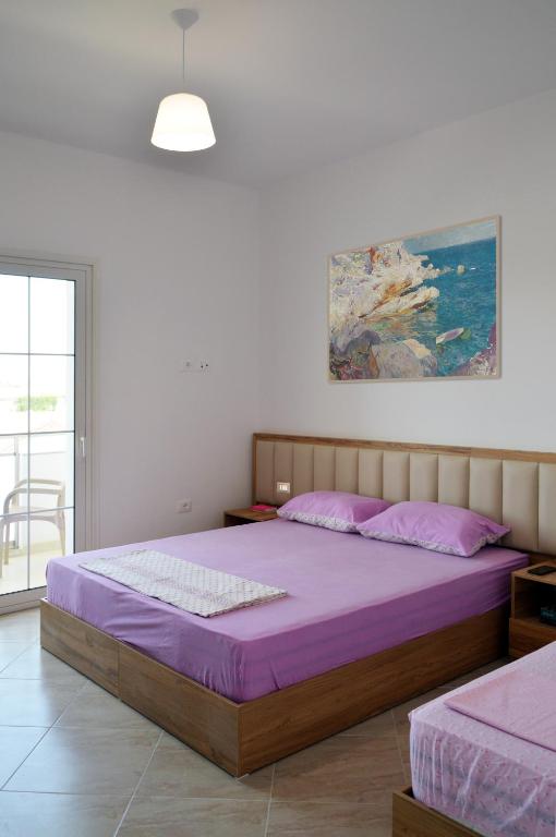 Postel nebo postele na pokoji v ubytování Villa Luelfa