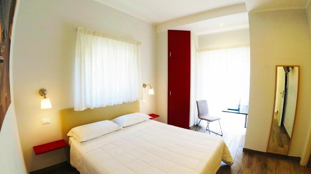 Postel nebo postele na pokoji v ubytování Hotel Rio Claro