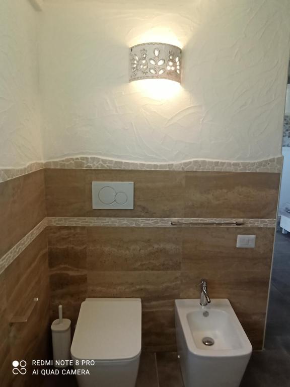 A bathroom at Bello Bello Rooms