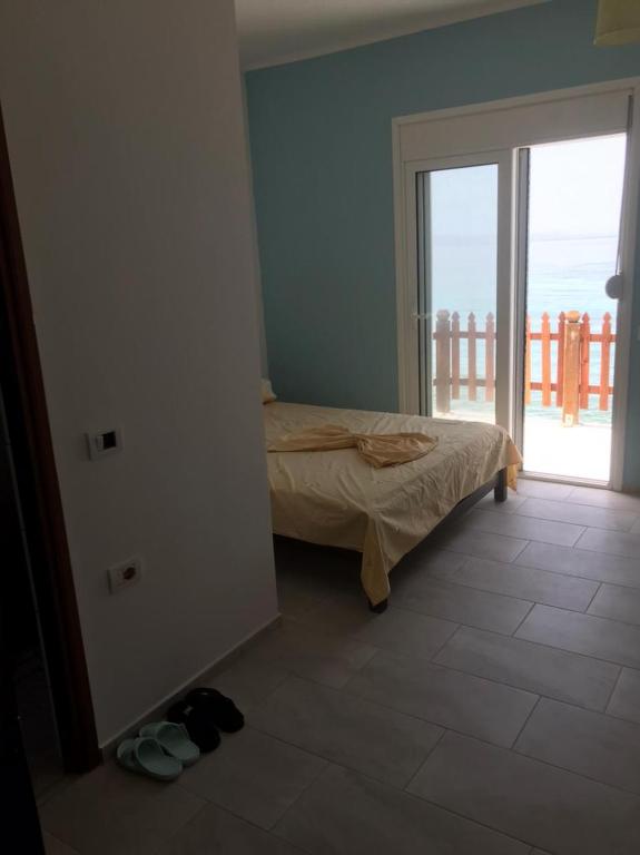 Postel nebo postele na pokoji v ubytování Villa John