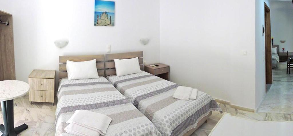 Postel nebo postele na pokoji v ubytování Egeon Rooms and Studios