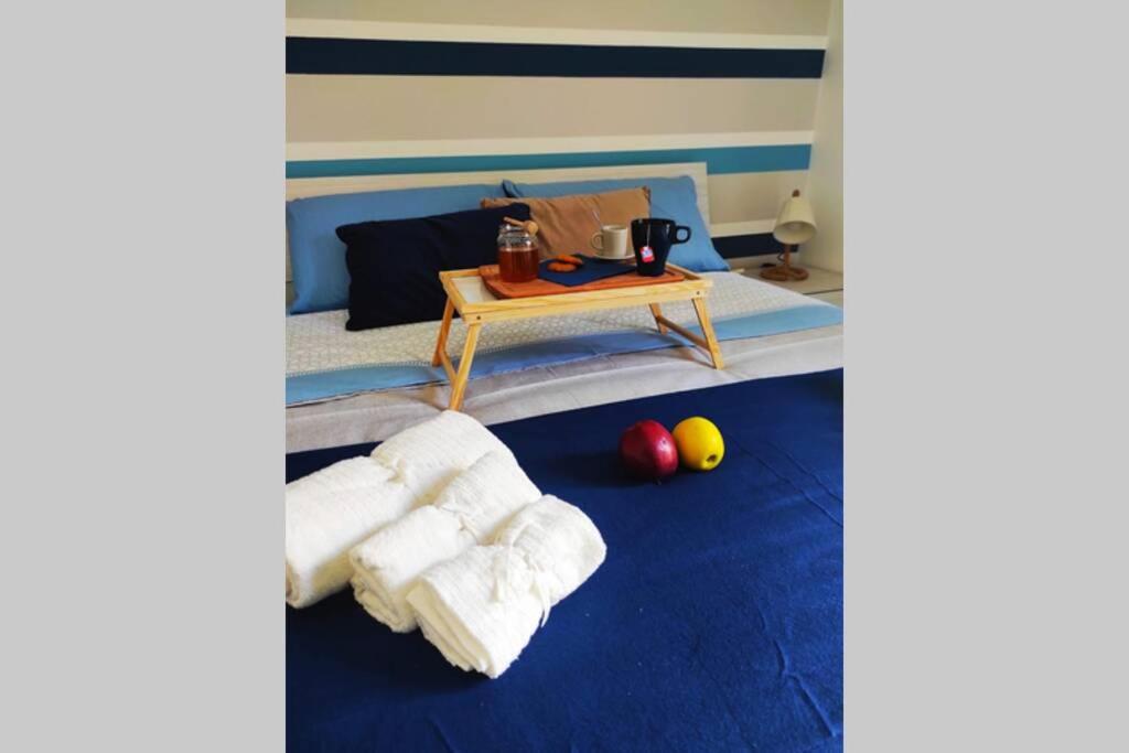 Posteľ alebo postele v izbe v ubytovaní Casa Angelina a due passi dal mare