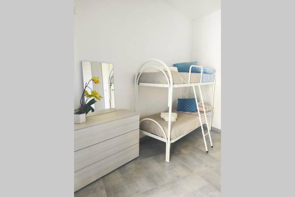 Posteľ alebo postele v izbe v ubytovaní Casa Angelina a due passi dal mare