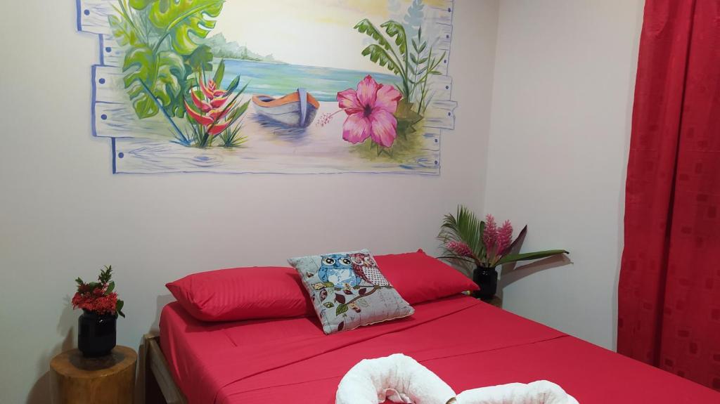 Postel nebo postele na pokoji v ubytování Playa Mareygua Hostal