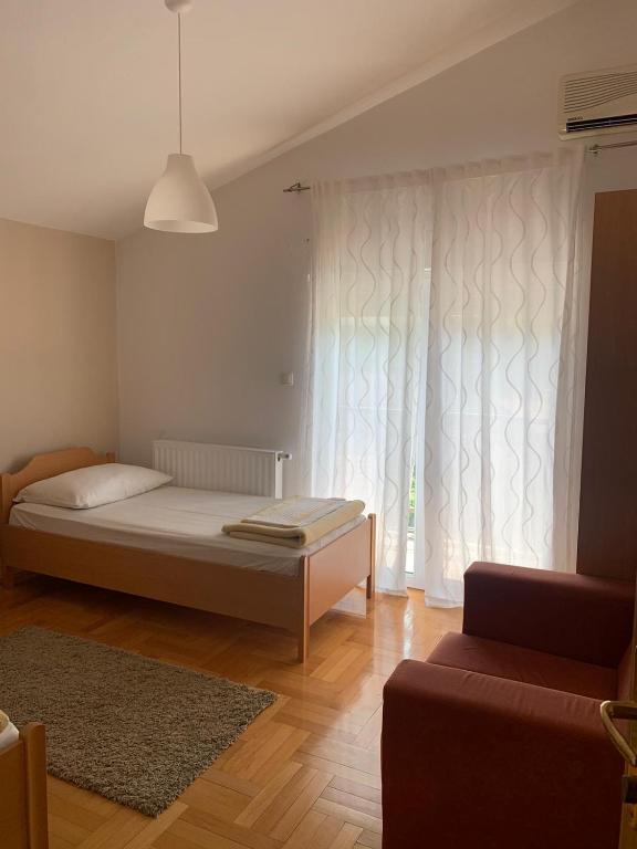 Postel nebo postele na pokoji v ubytování Pansion Villa Bubalo