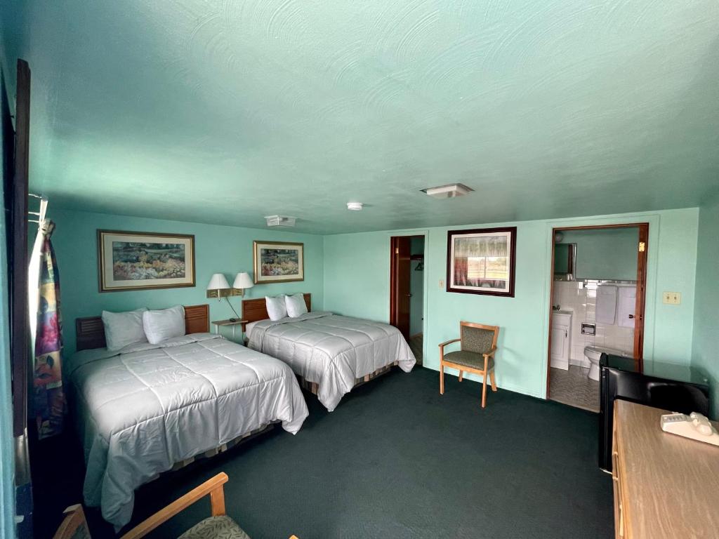 Кровать или кровати в номере Best Motel Bowling Green