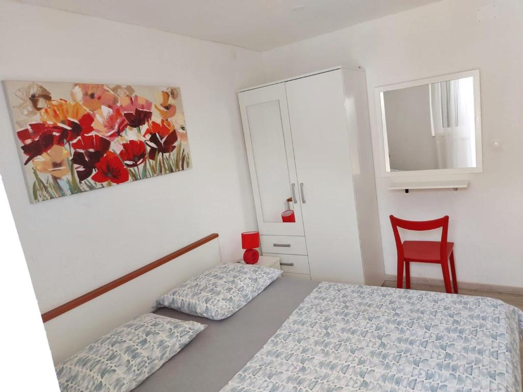Posteľ alebo postele v izbe v ubytovaní Apartments Villa Antony