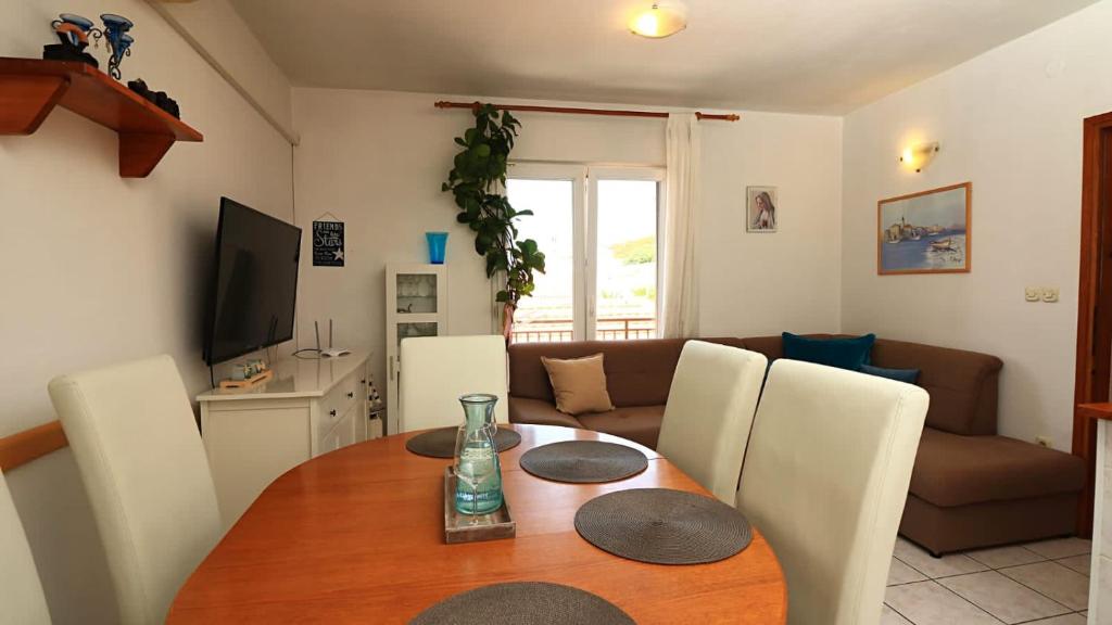 TV a/nebo společenská místnost v ubytování Apartmani Meri