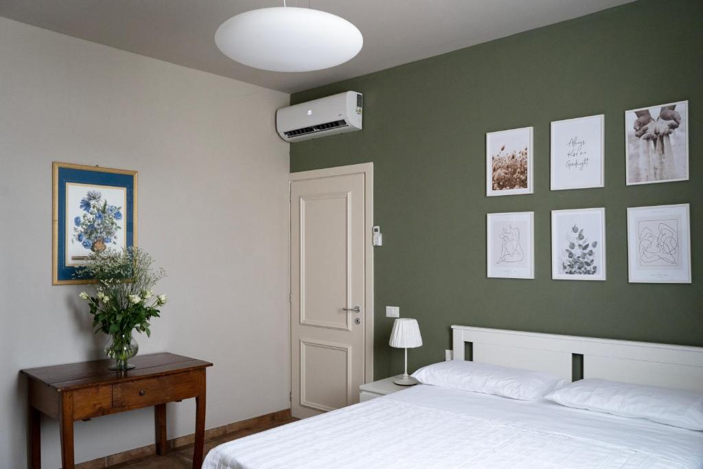 Postel nebo postele na pokoji v ubytování PODERE IL QUADRO