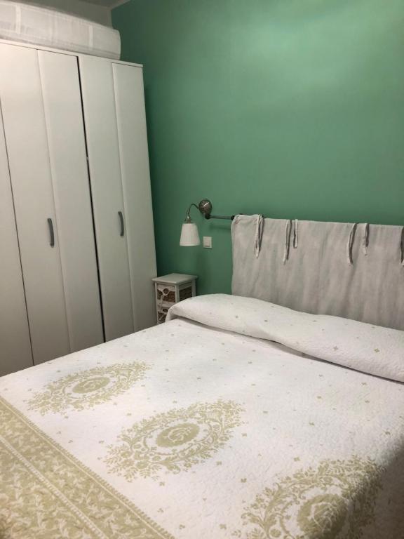 Posteľ alebo postele v izbe v ubytovaní appartamenti Silvio