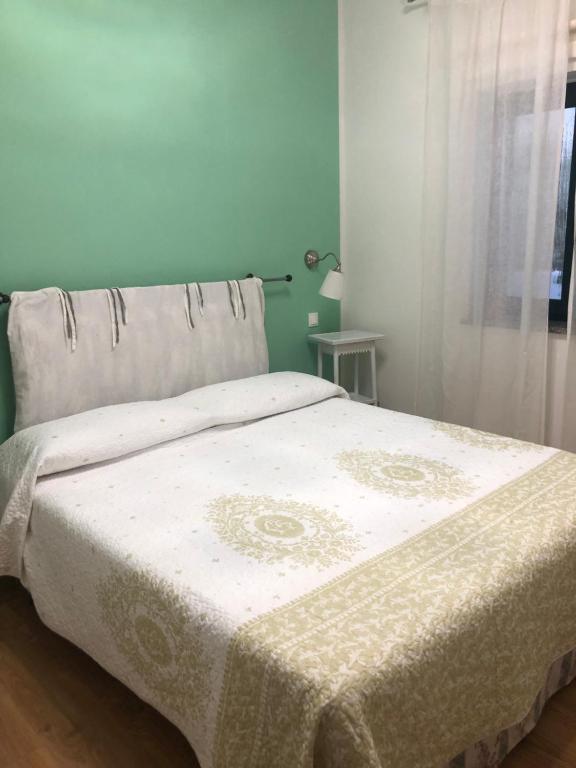 Posteľ alebo postele v izbe v ubytovaní appartamenti Silvio