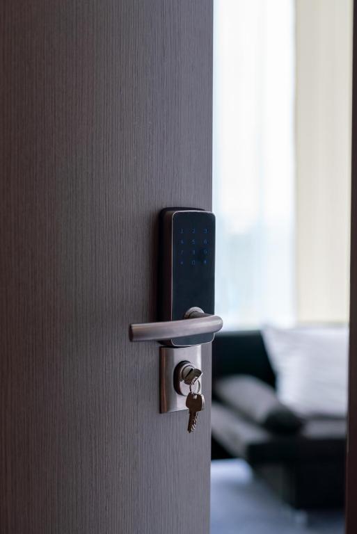 Posteľ alebo postele v izbe v ubytovaní Aquila Hotel
