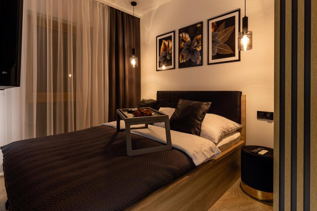 Posteľ alebo postele v izbe v ubytovaní Apartament Nadmotławie 34