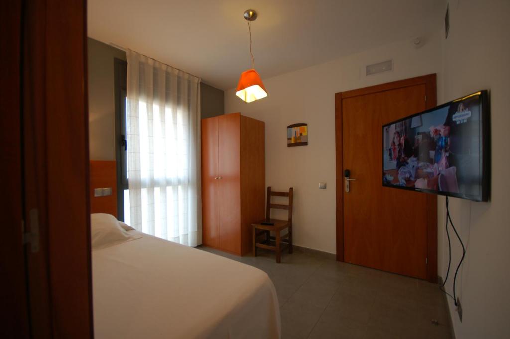 TV a/nebo společenská místnost v ubytování Sitges Apartment