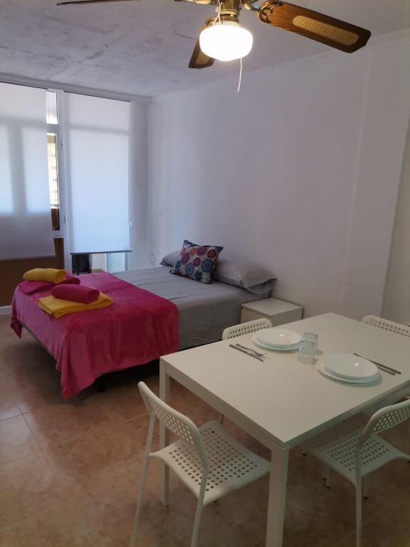 Postel nebo postele na pokoji v ubytování Apartament puerto