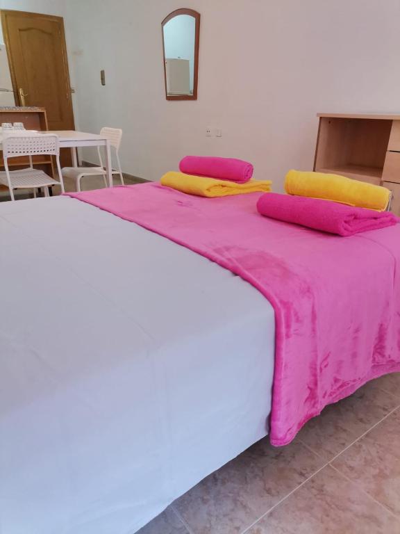 Postel nebo postele na pokoji v ubytování Apartament puerto