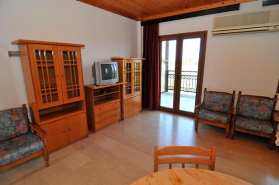 TV a/nebo společenská místnost v ubytování Hotel Coral