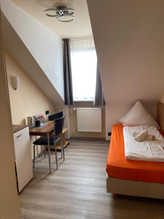 Postel nebo postele na pokoji v ubytování Hotel Schweizer Stubb