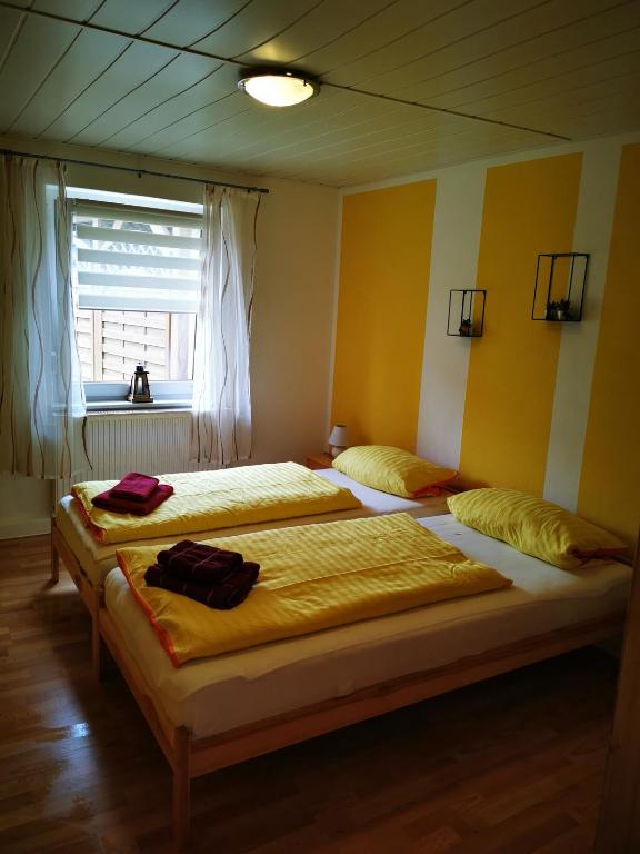 Postel nebo postele na pokoji v ubytování Sonnengarten