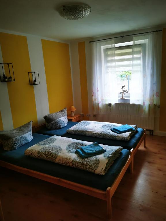 Postel nebo postele na pokoji v ubytování Sonnengarten