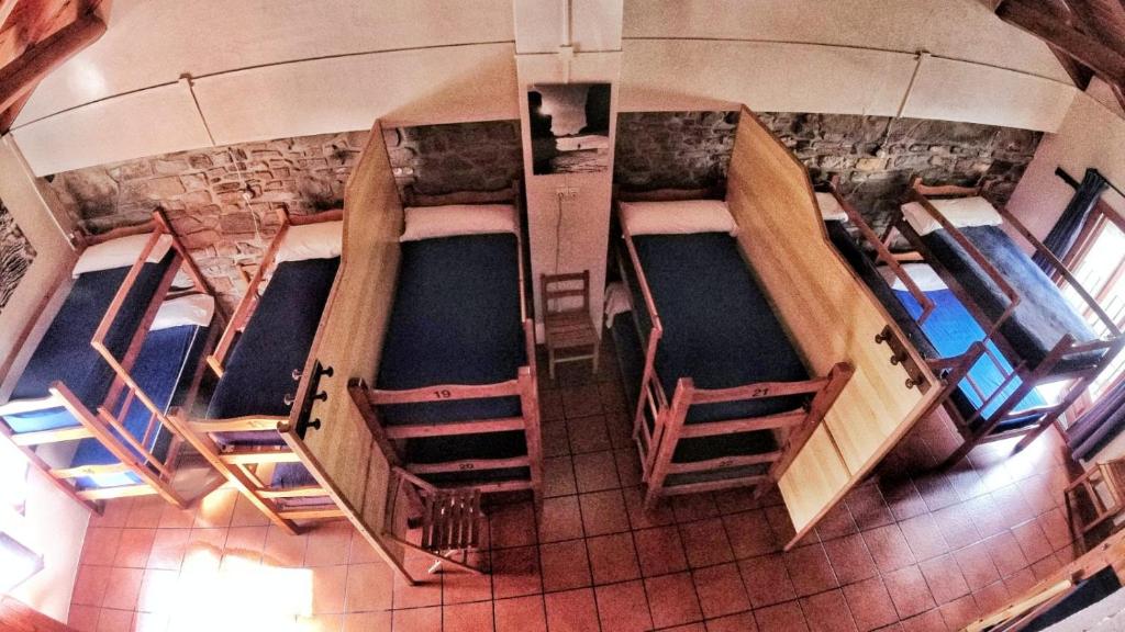 Postel nebo postele na pokoji v ubytování Refugio Lucien Briet