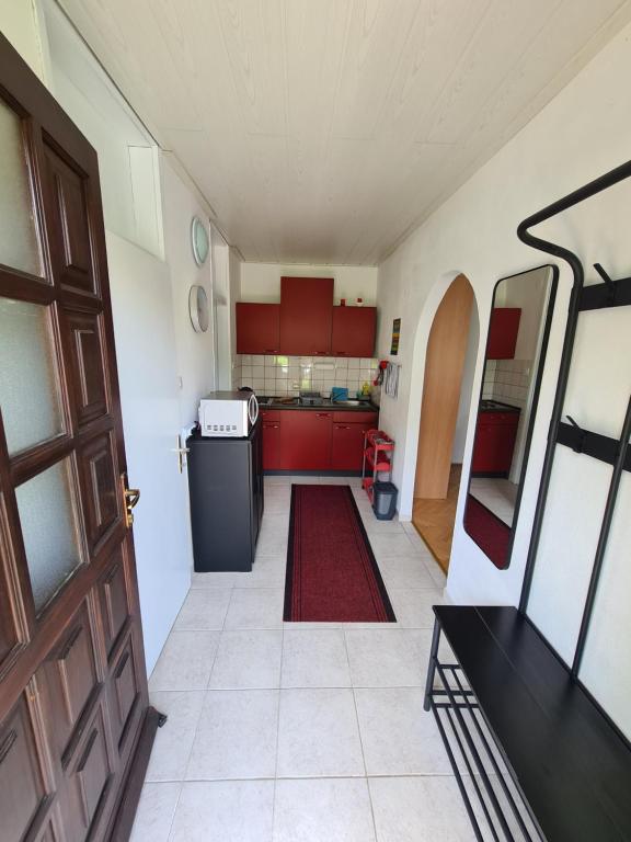 Kuchyň nebo kuchyňský kout v ubytování Apartman Tamy