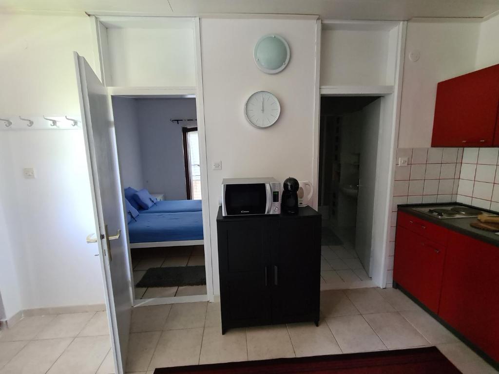 Postel nebo postele na pokoji v ubytování Apartman Tamy