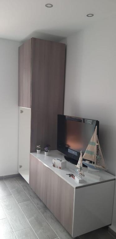 Televízia a/alebo spoločenská miestnosť v ubytovaní Estudio PREMIUM Vera Playa Naturista