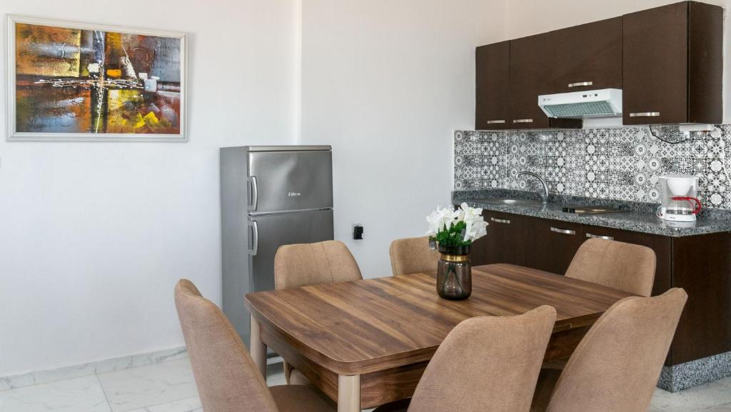 Kuchyň nebo kuchyňský kout v ubytování Sables D'or Appart Hôtel