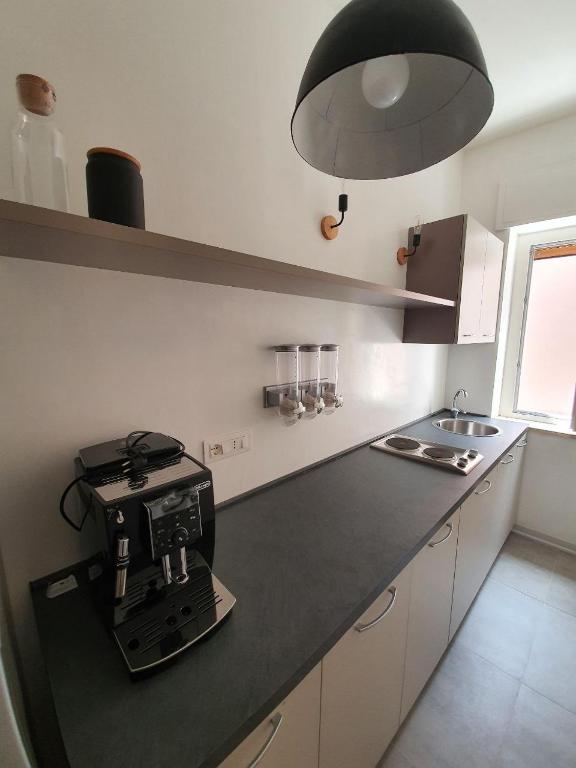 Kuchyň nebo kuchyňský kout v ubytování A Due Passi - Superior B&B