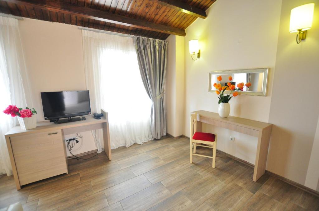 TV a/nebo společenská místnost v ubytování Michelangelo Resort