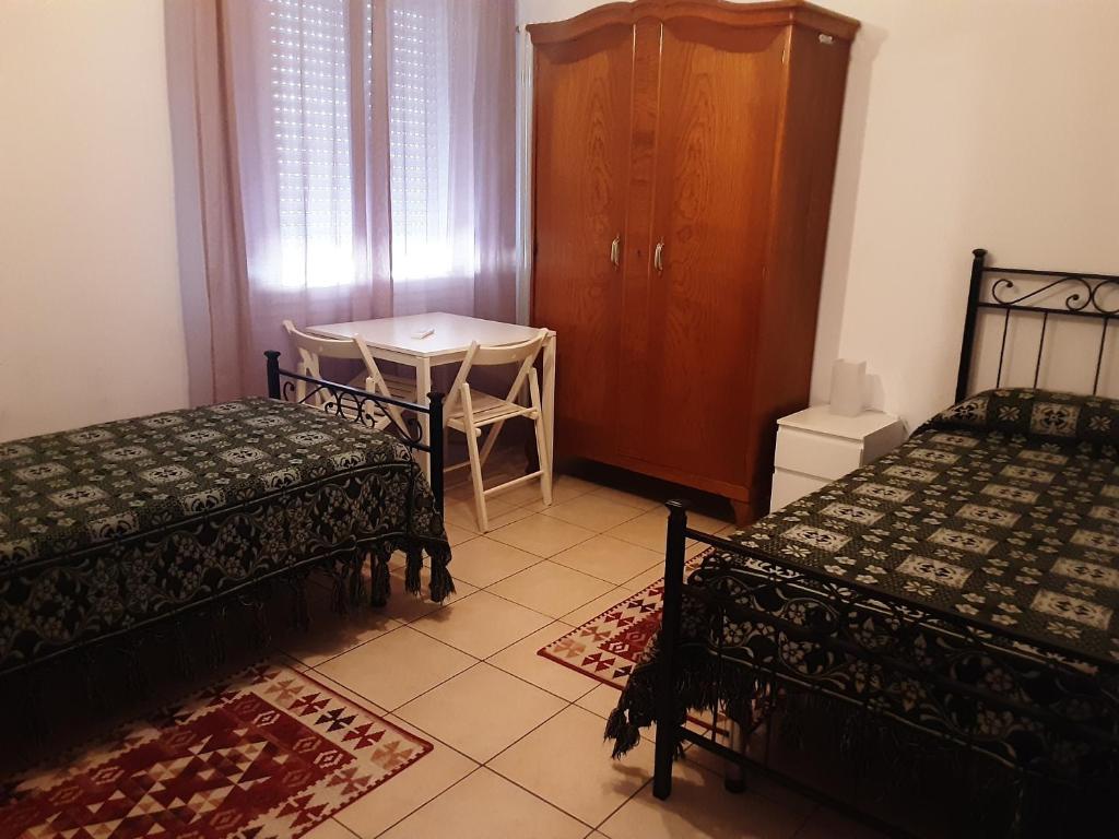 Locazione Menini - Camere zona stazione - Twin Room