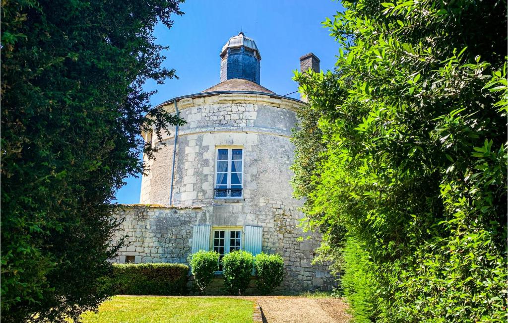 an old stone building with a tower on top of it at Nice Home In Chinon With 2 Bedrooms And Wifi in Chinon