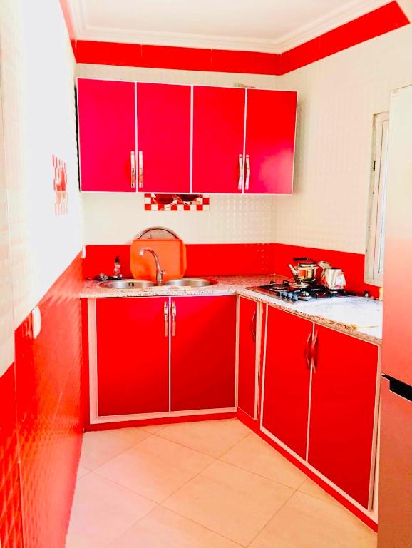 Kuchyň nebo kuchyňský kout v ubytování Appartement Charmant