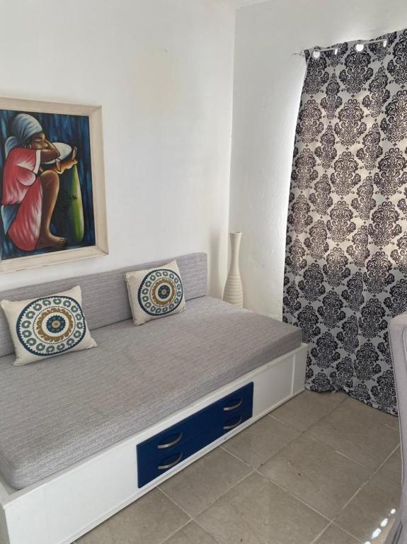 Postel nebo postele na pokoji v ubytování Chao Mamá Hostal