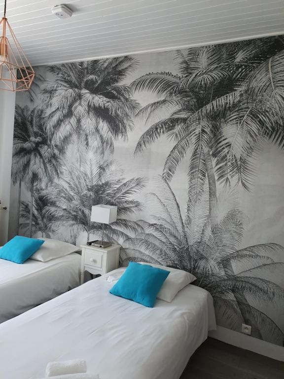 Postel nebo postele na pokoji v ubytování Ma Petite Auberge