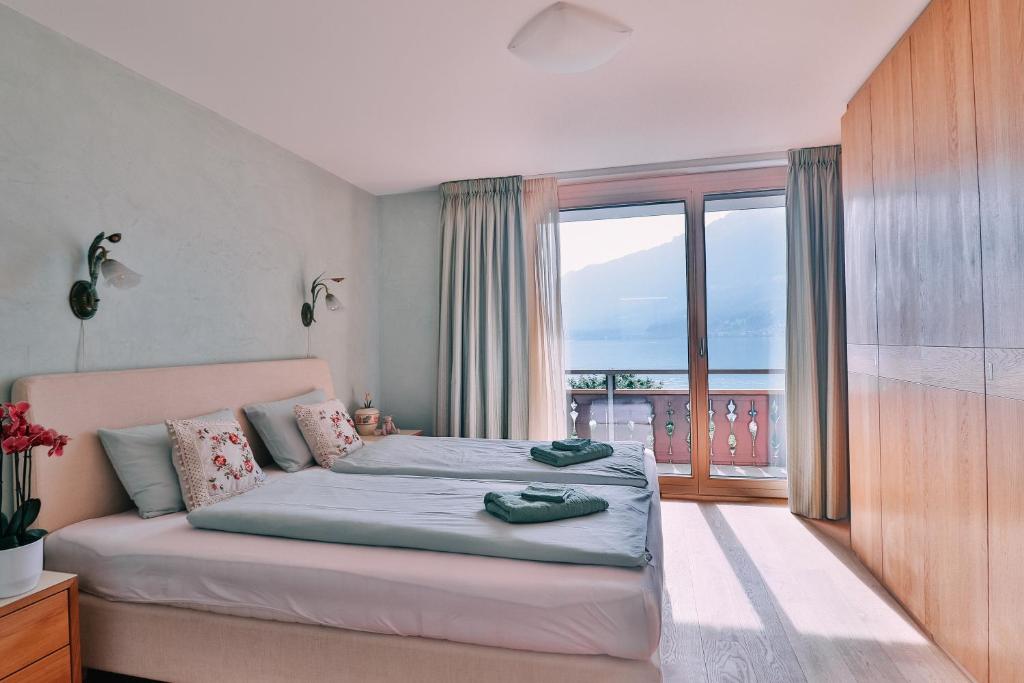 Postel nebo postele na pokoji v ubytování Seehaus Lake View 3-Bedroom Apartment