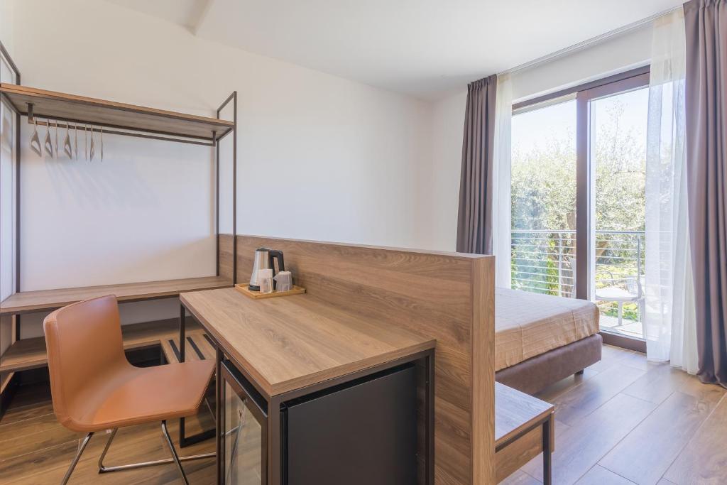 Fotografie z fotogalerie ubytování INSULA FELIX Bed&Breakfast v destinaci Moniga