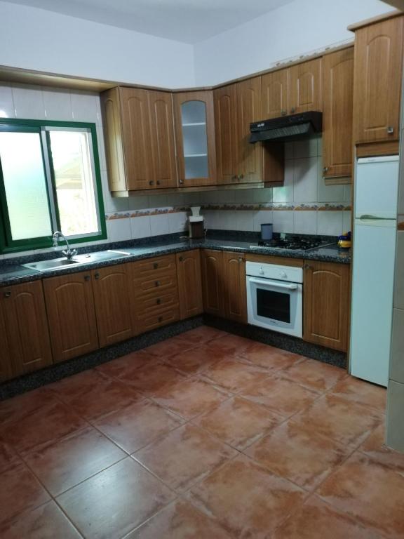 Kuchyň nebo kuchyňský kout v ubytování Casa Mari Carmen y Jose