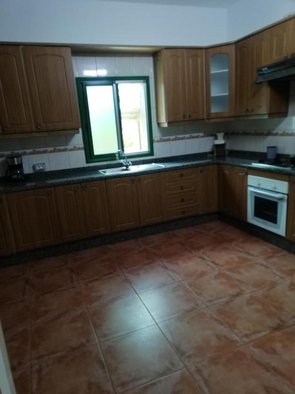 Kuchyň nebo kuchyňský kout v ubytování Casa Mari Carmen y Jose