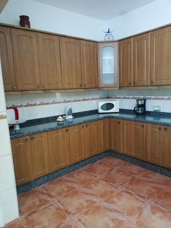 Kuchyň nebo kuchyňský kout v ubytování Casa Mari Carmen y Jose