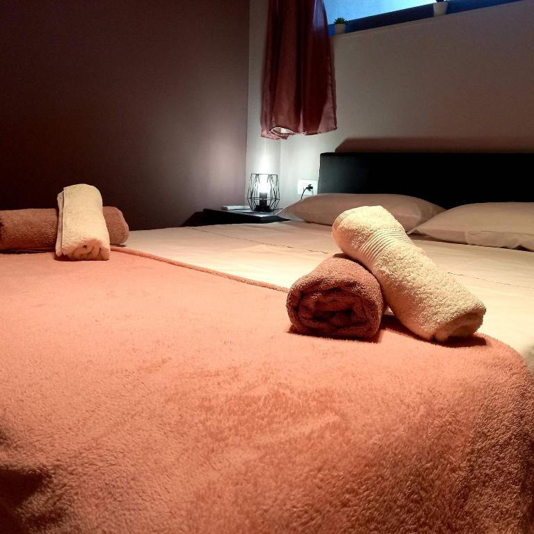 Łóżko lub łóżka w pokoju w obiekcie Etoile apartment