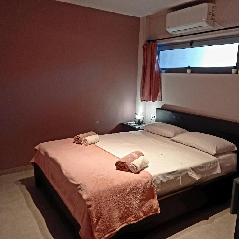 Łóżko lub łóżka w pokoju w obiekcie Etoile apartment