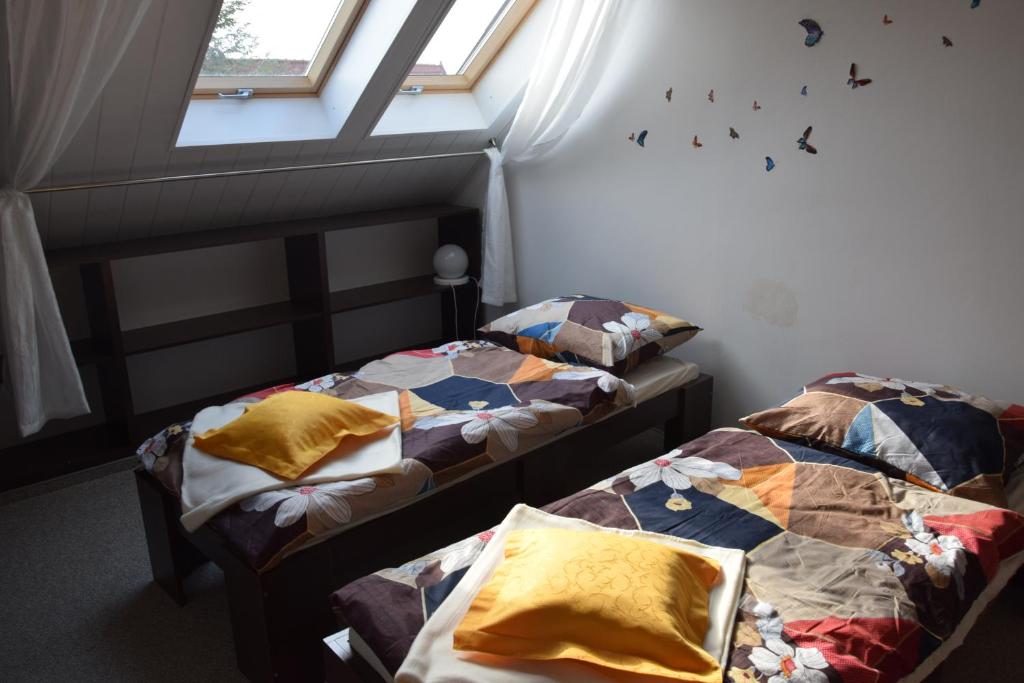 Posteľ alebo postele v izbe v ubytovaní Apartament Czos