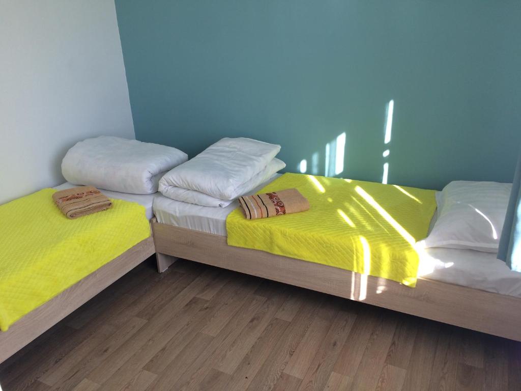 Postel nebo postele na pokoji v ubytování KbH-Karakol based Hostel