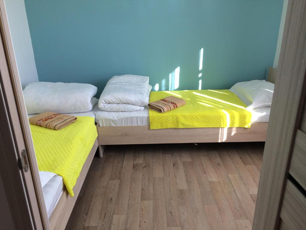 Postel nebo postele na pokoji v ubytování KbH-Karakol based Hostel
